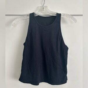 Vuori high neck ribbed black tank top in size medium